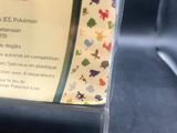 a plaque with a picture of a pokemon character on it