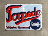 a sign that says torpedo on the side of a building
