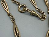 an image of a long gold chain with a clasp