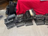 a lot of typewriters that are on the floor