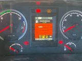 a close up of the dashboard of a car with various gauges