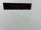 a close up of a scale with a red arrow on it