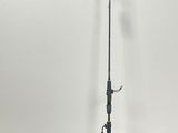 a close up of a fishing rod on a stand in a room