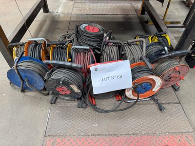 a lot of wires and hoses on the ground