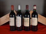 three bottles of wine sit on a red cloth with a wooden box in the background
