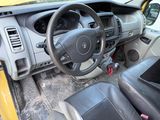 a car with a steering wheel and a dash board