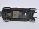 a toy train that is sitting on a white surface