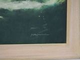 a painting on the wall of a room that has a picture of a boat in the water