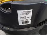 a close up of a yellow cord connected to a blower