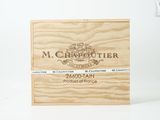une boîte en bois sur laquelle est collée une étiquette portant l'inscription « m chambootter »