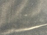 a close up of a piece of cloth on a table