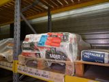 many packages on the shelves in the warehouse