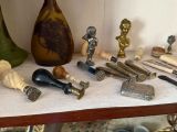 a table with a lot of antique items on it