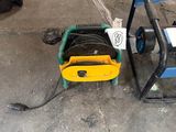 a blue and yellow machine and a yellow and black machine on the ground