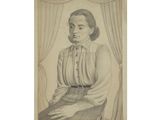 an old black and white photo of a woman sitting in a chair