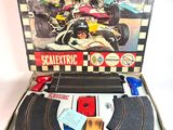 a box with a model racing track in it