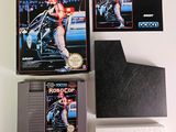 the game boy ' s version of rob cop is on the table