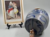 a picture of a vase and a picture of a woman