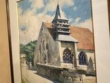 a painting of a church on the wall next to a clock