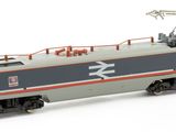 a model train that is on the tracks on a white surface
