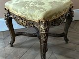 an image of a chair with a green upholstered seat