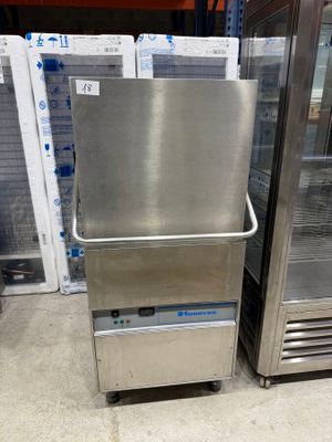 two stainless steel refrigerators sitting next to each other in a store