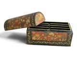 an image of a small wooden box with a floral design on it