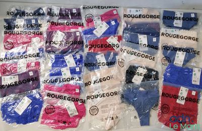 a pile of red, white, and blue socks are on a table