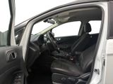 the interior of a car with the door open and the driver ' s seat down