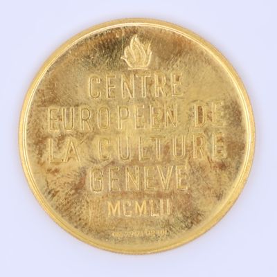 a gold coin with a picture of a man on it