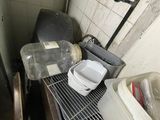 a lot of dirty dishes on the counter in the kitchen