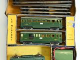 a box with a bunch of toy trains in it