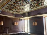 a room that has a stained glass ceiling in it