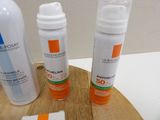 three different types of sunscreens sitting on a table