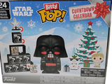 une boîte contenant un Darth Vader et un sapin de Noël