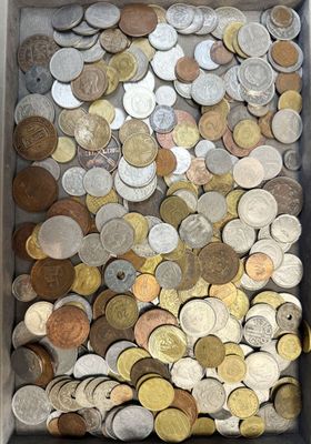 a lot of coins in a box on the table