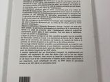 the back cover of a book on a white table