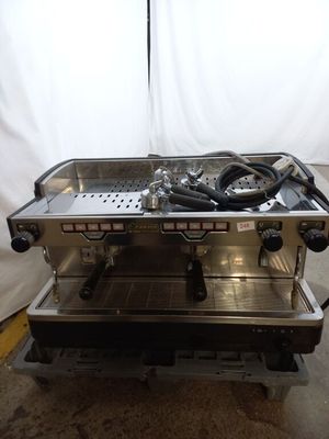 a coffee machine that is sitting on top of a table