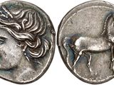 une pièce d'argent sur laquelle figurent une femme et un cheval
