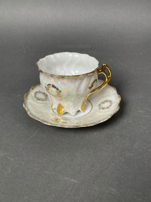 an image of a cup and saucer on a saucer