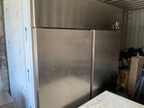 an image of a kitchen with a refrigerator in it
