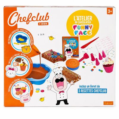 une boîte contenant un kit de pâtisserie « Craft Club » avec un chef et des cupcakes