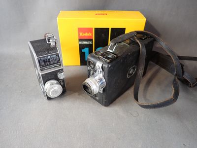 a camera and a camera case sitting next to each other