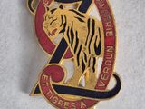 a close up of a badge with a tiger on it