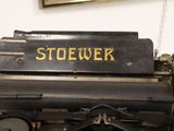 a close up of an old typewriter with the word stoever written on it