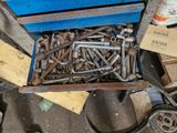 a box full of wrens and other tools sitting on the floor