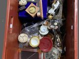 a box full of assorted items sitting on a table