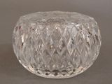 a clear glass vase with a diamond pattern on it