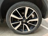 a close up of a tire on a car ' s rim