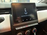 a picture of a car dashboard with a tablet on it